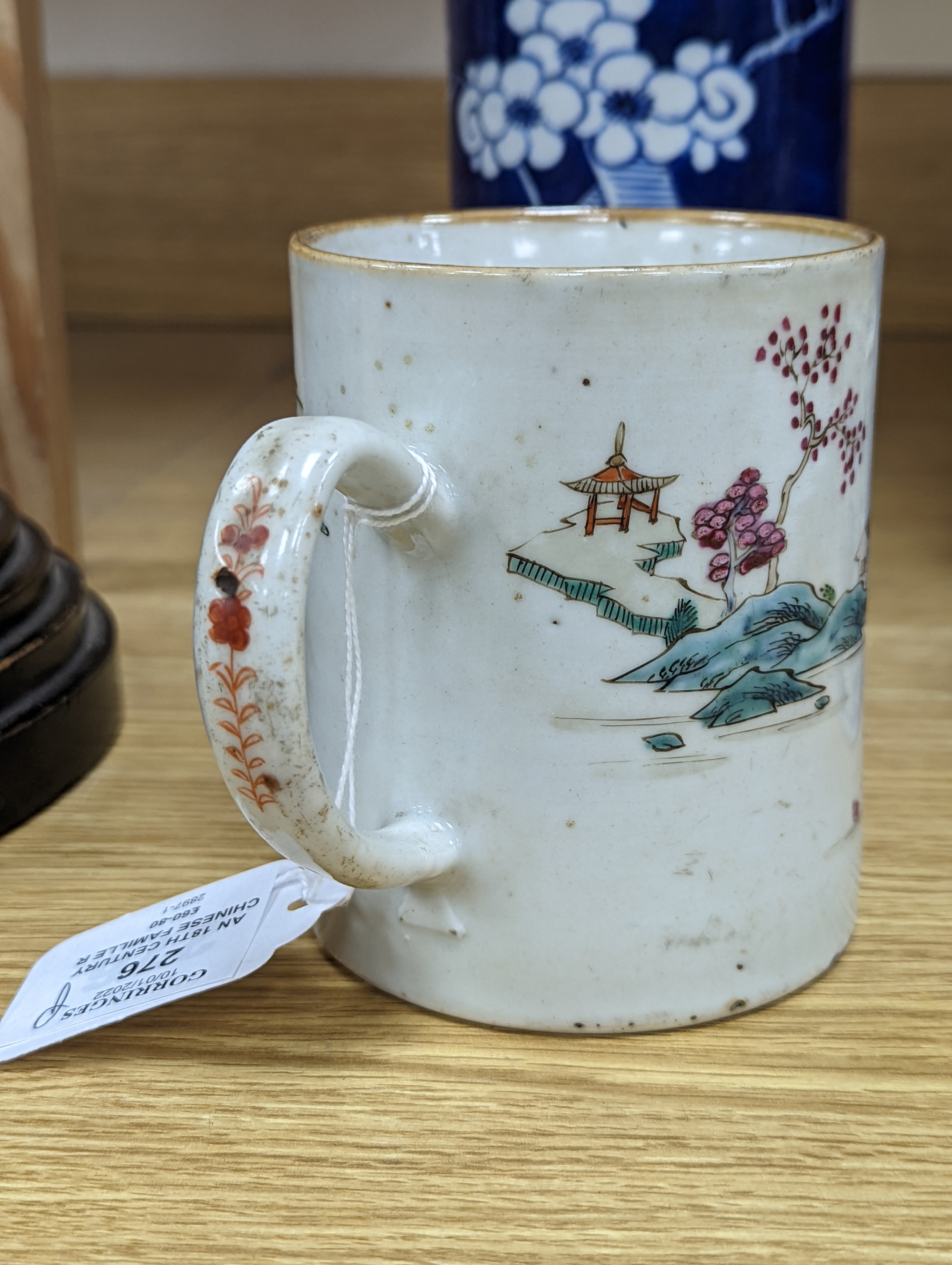 An 18th century Chinese famille rose mug, a Chinese Imari tea caddy and two Chinese blue and white sleeve vases 30cm (4)